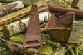 Old discarded things. Rusty hacksaw and bread baking dish