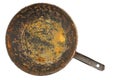 old disgusting stained rusty cast iron pan with burnt fat and food leftovers isolated in directly above perspective