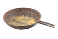 old disgusting stained rusty cast iron pan with burnt fat and food leftovers isolated