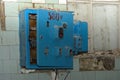 Old dismantled and rusty electrical panel assembly Royalty Free Stock Photo
