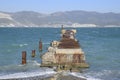 Old dismantled rusty pier. The inscription: it is forbidden to swim. The destroyed pier Royalty Free Stock Photo