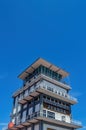 The old disused Juanda International Airport Air Traffic Control Tower against the backdrop of a clear blue sky