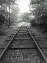 Old disused railway line disappears into the distance Royalty Free Stock Photo