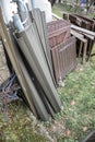 Old disused roller shutters stacked outside the house. Royalty Free Stock Photo