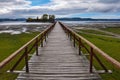 Old dock linking to an isolated island, ChiloÃÂ© Is Royalty Free Stock Photo