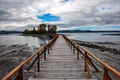 Old dock linking to an isolated island, ChiloÃÂ© Is Royalty Free Stock Photo