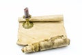 Old documents and candle in bronze candlestick isolated on a white background. Space for text Royalty Free Stock Photo