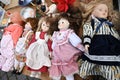 Old dolls flea market group objects Royalty Free Stock Photo