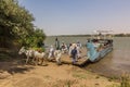 OLD DONGOLA, SUDAN - MARCH 1, 2019: People leaving a ferry near Old Dongola, Sud