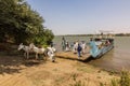 OLD DONGOLA, SUDAN - MARCH 1, 2019: People leaving a ferry near Old Dongola, Sud