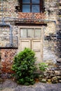 Old door of an abandoned house Royalty Free Stock Photo