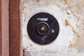 Old vintage door bell button on grunge wall Royalty Free Stock Photo