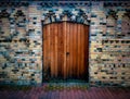 Old door, brick wall