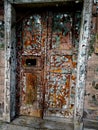 Old door with cracked pilled paint