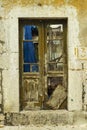 Old door in the destroyed building Royalty Free Stock Photo