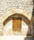 Old door detail for backgrounds of the architectural complex of the Bodegas Guell in El Garraf, Barcelona Royalty Free Stock Photo