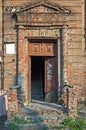 Old door in dilapidated house Royalty Free Stock Photo