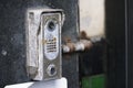 Old door entry buzzer intercom broken require repair Royalty Free Stock Photo