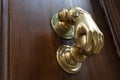 Old door handle on an ancient wooden door. Royalty Free Stock Photo