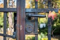 Old door handle on cemetery entrance gate Royalty Free Stock Photo