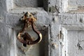 Old door handle, detail of an ancient door of the Saint John the Baptist church in Riomaggiore, Italy Royalty Free Stock Photo