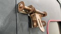 Old door handle with keyhole and lock Royalty Free Stock Photo