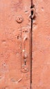 Old door handle red texture Royalty Free Stock Photo