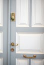 Old door handle in a typical painted blue on the of Santorini Royalty Free Stock Photo