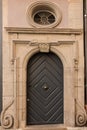 Old door of a historical building with stairway