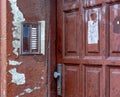 The old door of the House. intercom on the old wall Royalty Free Stock Photo