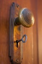 Old Door knob with key Royalty Free Stock Photo