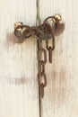 Old door with lock and chain Royalty Free Stock Photo