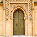 old door in morocco africa ancien and wall ornate brown Royalty Free Stock Photo