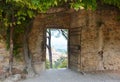 An old door opens a window into the magical world of Tuscany.