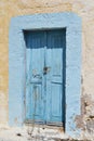 Old door of ruined home in Kefalos