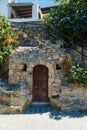 Old door on street of Lindos Rhodes island Greece Royalty Free Stock Photo