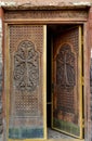 Ancient wooden door. Facade of the temple Armenia.