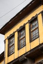 Old doors and windows damaged from weather in ancient city of Gjirokaster in Albania exploring Balkan stock photography travel