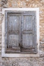 Old double closed wooden shutters. Vertical view Royalty Free Stock Photo