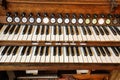 Old double piano keyboard with marked keys Royalty Free Stock Photo