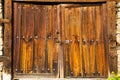 Old double rustic wooden barn doors Royalty Free Stock Photo