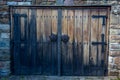 Old double wooden house door to street in Bulgaria Royalty Free Stock Photo