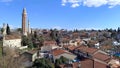 The old tiled roofs of Antalya. Yivli minaret. Royalty Free Stock Photo