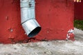 Old drain pipe on the brown brick wall. Downspout. Royalty Free Stock Photo