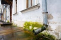 Old drainpipe on the wall. Royalty Free Stock Photo