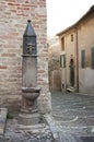 Old drinking fountain at the Italian fiorenzuola di focara Royalty Free Stock Photo