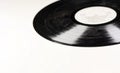 An old and dusty black vinyl record isolated on a white background Royalty Free Stock Photo