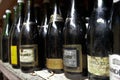 Old dusty bottles in a old cellar
