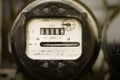 Old dusty electricity supply meter Royalty Free Stock Photo