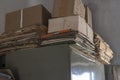 Old dusty stack of papers, files, documents on the shelves of the archive room